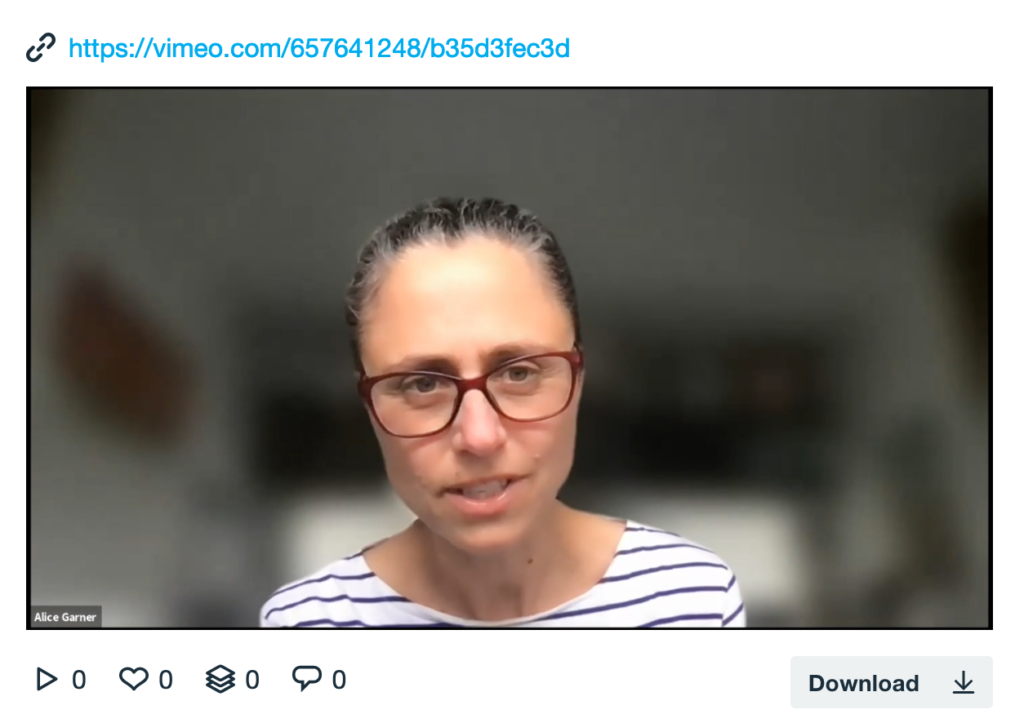 Close up of woman with glasses talking to camera